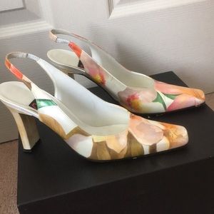 Melian open back pumps